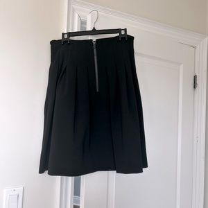 Pleated skirt. Jersey material. Excellent condition fall staple in your closet!